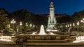 North-eastern side of the Cervantes monument timelapse on the Square of Spain in Madrid at night Royalty Free Stock Photo