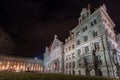 North entrance to granite and red roof New York State Capitol building at night with state Education Department building in the Royalty Free Stock Photo