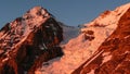 The north face of Jungfrau mountain peak in warm red evening light in the Swiss Alps above Grindelwald Royalty Free Stock Photo