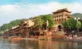 North Gate Tower and Tuojiang River in Fenghuang, Hunan Province, China.