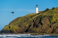 North Head Lighthouse. Coast guard helicopter in the sky.