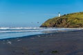 North Head Lighthouse. Coast guard helicopters in the sky. Royalty Free Stock Photo