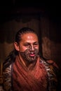 NORTH ISLAND, NEW ZEALAND- MAY 17, 2017: Close up of a Maori man with traditionally tatooed face and in traditional