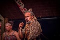 NORTH ISLAND, NEW ZEALAND- MAY 17, 2017: Close up of a Maori man with traditionally tatooed face and in traditional Royalty Free Stock Photo