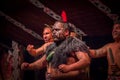 NORTH ISLAND, NEW ZEALAND- MAY 17, 2017: Close up of a Tamaki Maori leader man dancing with traditionally tatooed face Royalty Free Stock Photo