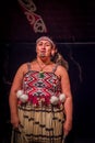 NORTH ISLAND, NEW ZEALAND- MAY 17, 2017: Close up of a Tamaki Maori woman with traditionally tatooed face and wearing