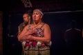 NORTH ISLAND, NEW ZEALAND- MAY 17, 2017: Close up of a Tamaki Maori woman with traditionally tatooed face and wearing