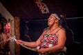 NORTH ISLAND, NEW ZEALAND- MAY 17, 2017: Close up of a Tamaki Maori woman with traditionally tatooed face and wearing