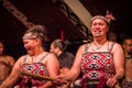 NORTH ISLAND, NEW ZEALAND- MAY 17, 2017: Close up of two Tamaki Maori ladies with traditionally tatooed face and wearing