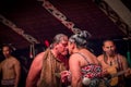 NORTH ISLAND, NEW ZEALAND- MAY 17, 2017: Tamaki Maori couple dancing with traditionally tatooed face in traditional Royalty Free Stock Photo