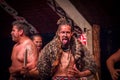 NORTH ISLAND, NEW ZEALAND- MAY 17, 2017: Tamaki Maori men one is sticking out tongue with traditionally tatooed face and