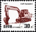 NORTH KOREA - CIRCA 1995: A stamp printed in North Korea from the `Machines` issue shows Excavator, circa 1995.