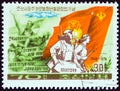 NORTH KOREA - CIRCA 1976: A stamp printed in North Korea shows Marchers with Flags, circa 1976.