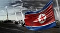 North Korea flag and Nuclear missiles in background