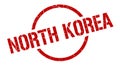 North Korea stamp. North Korea grunge round isolated sign.