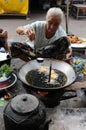 North Laos: Grilled fish and meat at the market of Luang Prabang City.