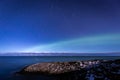 North lights Aurora Borealis seen from Atlantic Ocean road in winter night. Norwegian wintertime Royalty Free Stock Photo