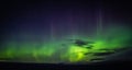 North lights Aurora Borealis seen from Atlantic Ocean road in winter night. Norwegian wintertime Royalty Free Stock Photo