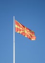 The North Macedonia Republic flag waving in the blue sky