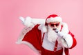 North-pole x-mas christmas celebrity grey beard santa claus sing microphone song have newyear live concert wear headwear Royalty Free Stock Photo