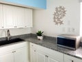 A vacation rental property with a small kitchenette near North Redington Beach, Florida, U.S