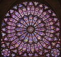 The North Rose stained glass window at Notre Dame de Paris Cathedral, France