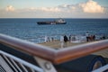 NORTH SEA - CIRCA JULY, 2017: Freight ship passes tourist ferry Royalty Free Stock Photo