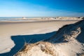 On the North Sea coast - The beautiful, extended white sandy beach in the northern part of the island Norderney, Germany