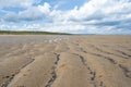 North Sea at the Crimdon beach, Hartlepool and Seaton Carew, England. Dark blue sky and sandy beach in United Kingdom