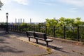 North Shore Esplanade Park in St. George of Staten Island with an Empty Bench along the Waterfront