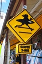 North Shore, Honolulu, Oahu/Hawaii, June 9, 2011: Surfer Crossing street sign in Haleiwa. Haleiwa is a popular destination for