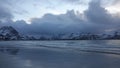 Ramsberg beach on Flakstad island on the Lofoten islands in winter at sunset