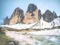 North side of Sexten Dolomites symbol. May view from popular trail around the rocks