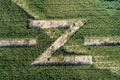 North sign made from trees aerial drone photo