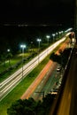 North-south avenue on night and motion cars