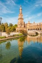 North tower with reflection in river at the Place of Espana in Sevilla, Spain Royalty Free Stock Photo