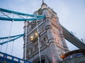 North tower of the Tower Bridge, London, as seen from the river below