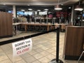 North Vancouver, BC, Canada - April 4, 2020: A restaurant has removed their tables and chairs. A sign `Sorry this section is close