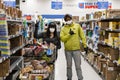 NORTH VANCOUVER, BC, CANADA - MAR 19, 2020: Shoppers at a local supermarket stocking up on groceries in anticipation of Royalty Free Stock Photo