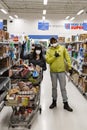 NORTH VANCOUVER, BC, CANADA - MAR 19, 2020: Shoppers at a local supermarket stocking up on groceries in anticipation of Royalty Free Stock Photo