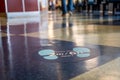 North Vancouver, Canada - 07.11.20: Sign on the floor in B.C. Ferries interior passenger ferry to stay 2 metres or 6 ft apart