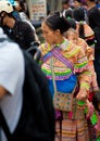 North Vietnamese woman in colorful native clothing with child on