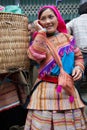 North Vietnamese woman in colorful native clothing at Bac Ha mar