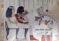 North wall fresco of Nakht and Tawy seated before the table of offerings in tomb TT52 in the Theban Necropolis near Luxor, Egypt. Royalty Free Stock Photo