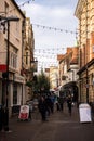 Northampton Town Center with shoppers walking towards the camera