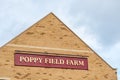 Northampton UK January 15 2018: Poppy Field Farmhouse Inn logo sign post in Duston