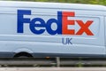 Northampton, UK - May 10th 2019: fedex uk delivery van on british motorway in motion Royalty Free Stock Photo