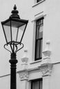 Northcote Mansions, Hampstead, London, UK. White painted building with architectural detail. Street lamp in foreground. Royalty Free Stock Photo