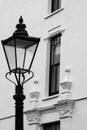 Northcote Mansions, Hampstead, London, UK. White painted building with architectural detail. Street lamp in foreground. Royalty Free Stock Photo