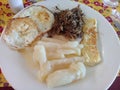 Northeast brazilian regional food: manioc, eggs, cheese and meat